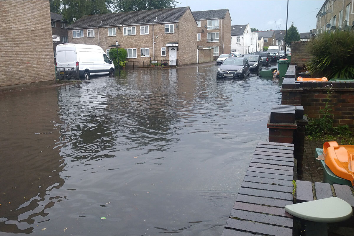 Flood water affecting a residential street in the United Kingdom