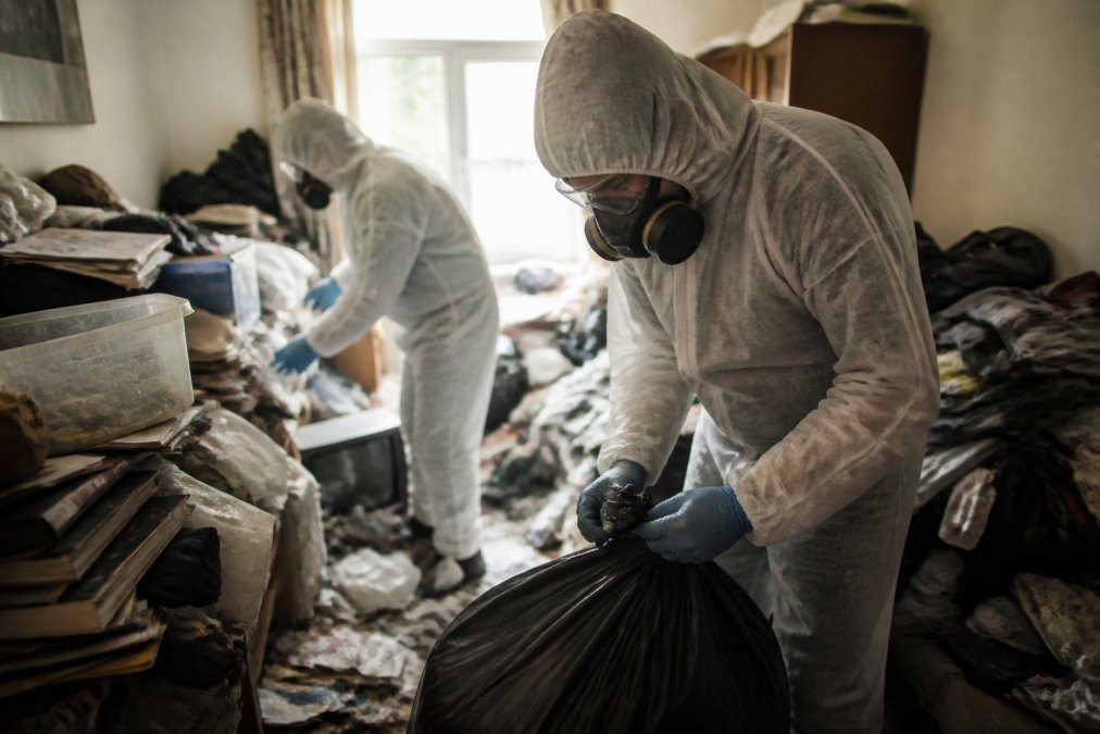Specialist team preparing for a controlled hoarding-property cleanup